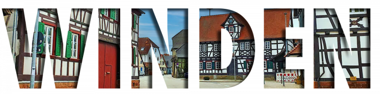 Schriftzug Winden in Großbuchstaben durch die man ein Foto der Fachwerkhäuser sieht.